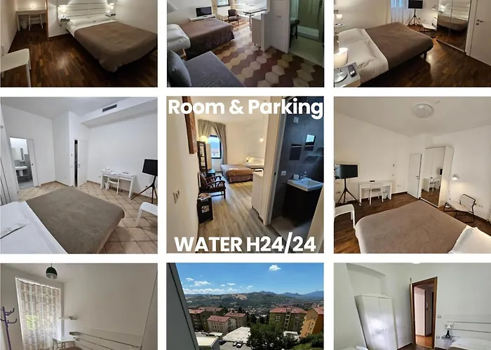 ESSENTIAL HOUSE In Centro Città Con Parcheggio Privato E WIFIAlbergo